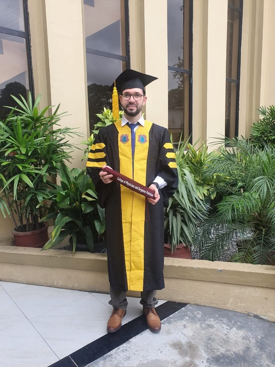 Dr. Zia Ullah Qazi in graduation attire